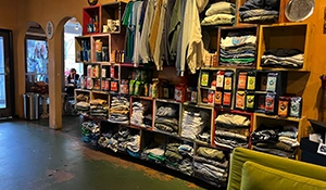 DeBeen wall of Coffee choices and apparel