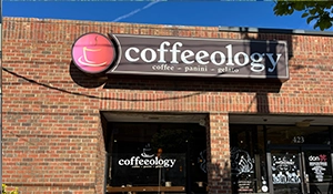 Coffeeology Sign on Building