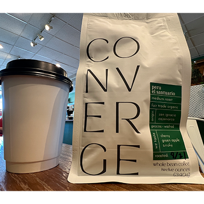 Caffee Driade 7 Converge Coffee Drink and bag of Converge Coffee